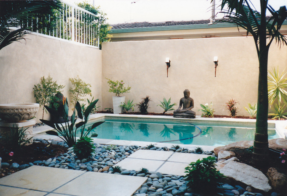 A plunge pool in a zen style garden